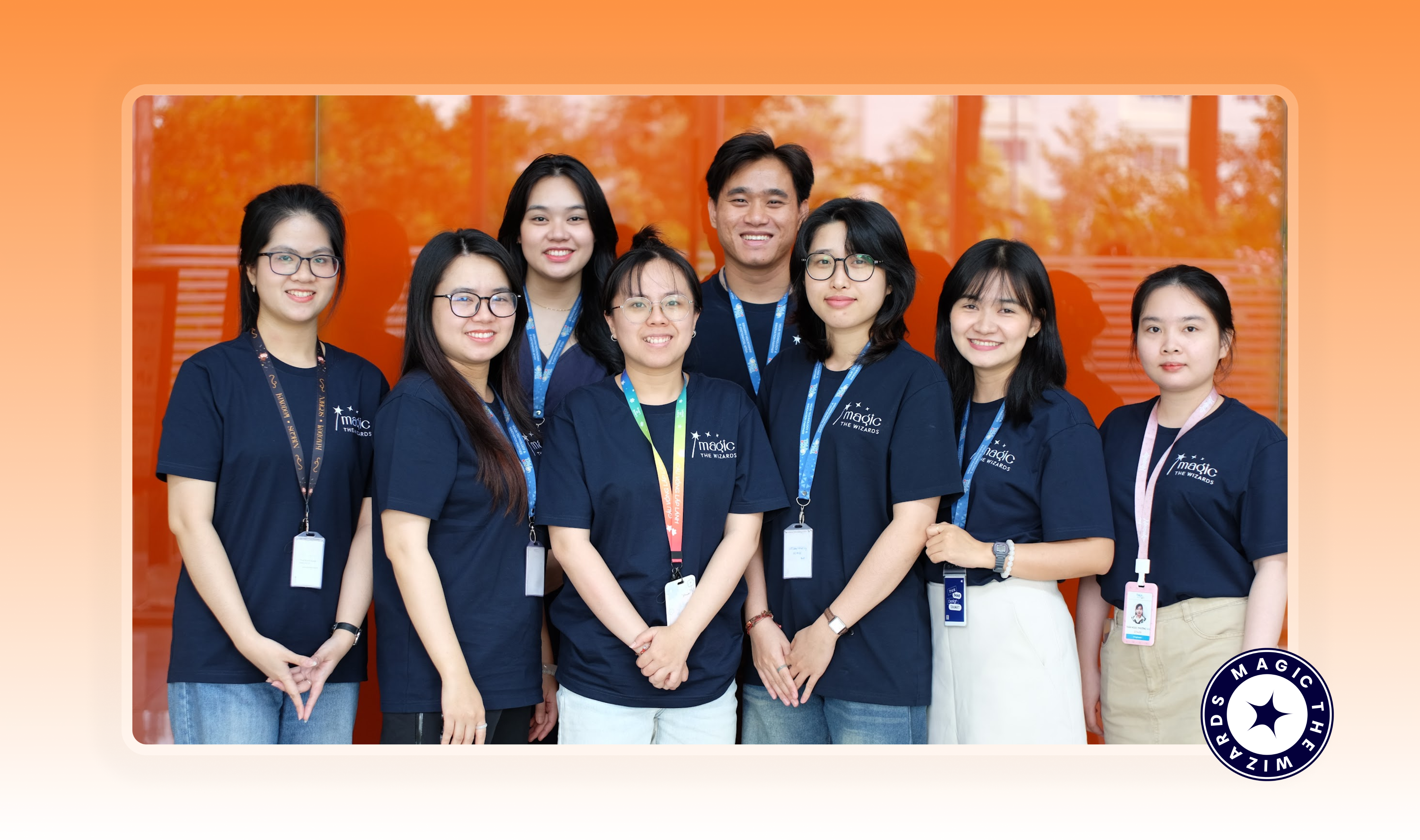 The design team posing together in matching branded t-shirts