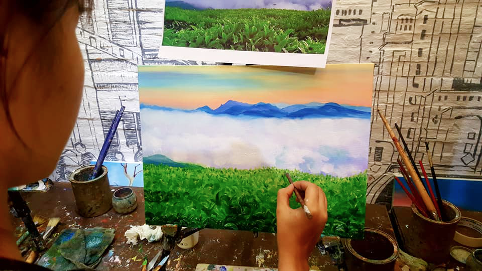 Oil painting of misty mountains above a green tea plantation at sunrise