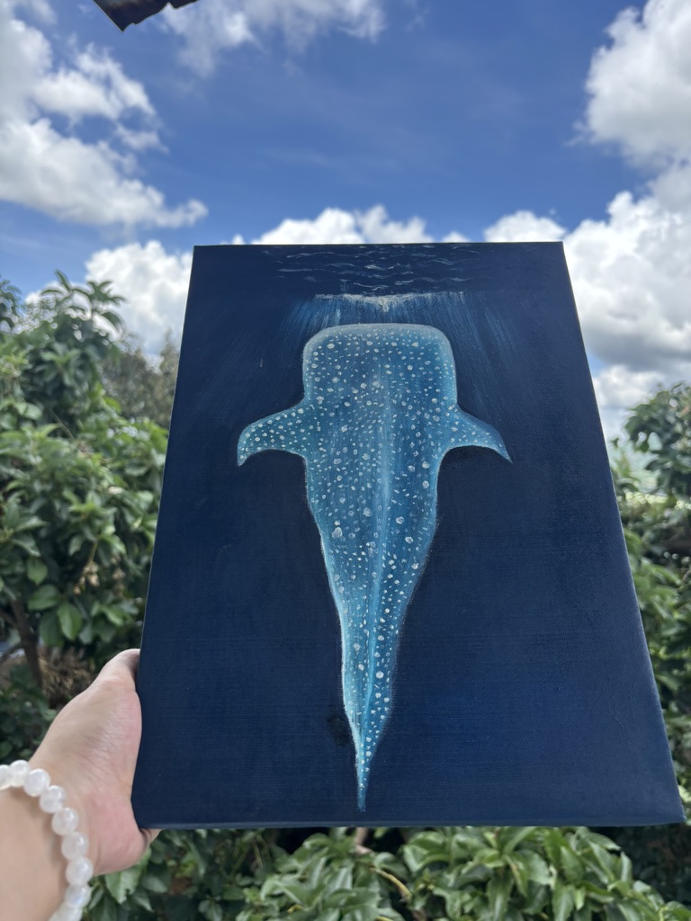 Oil painting of a whale rising through dark blue water