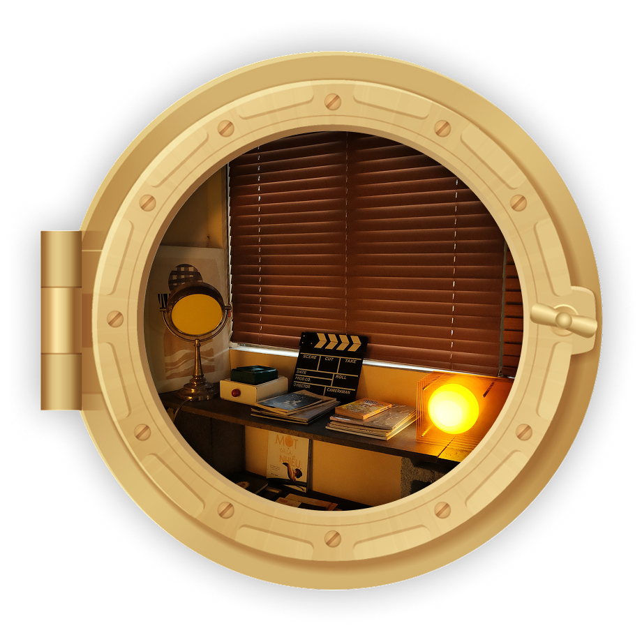 A cozy desk corner lit by a warm lamp, beside a window with blinds