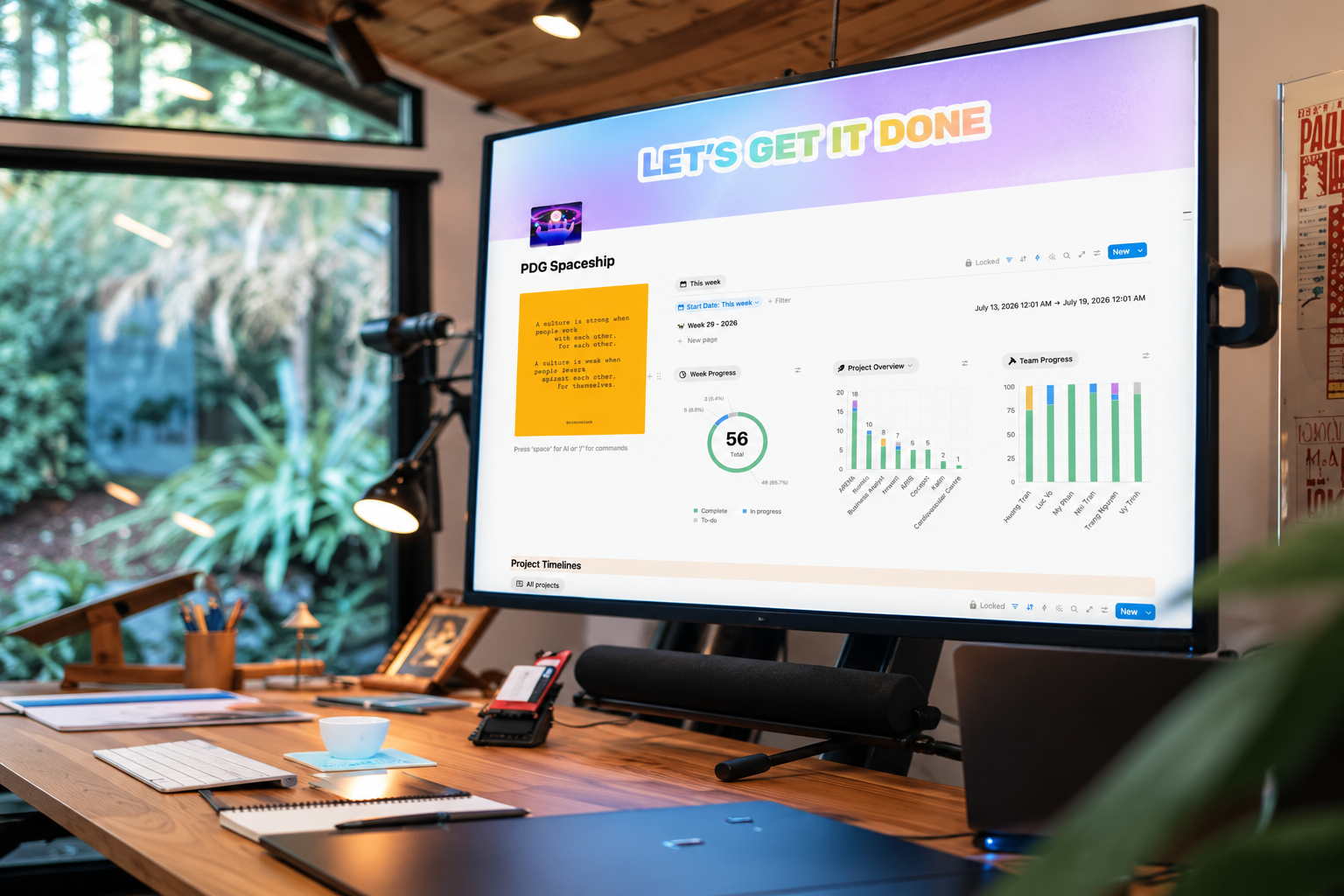 A large monitor showing a Notion workspace for a design team